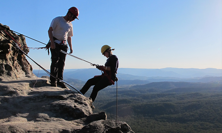Abseiling on the Mountains Edge